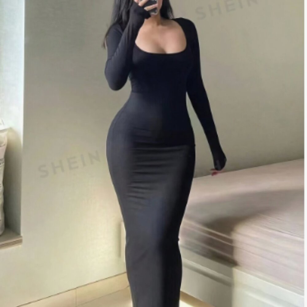 black bodycon dress with long sleeves